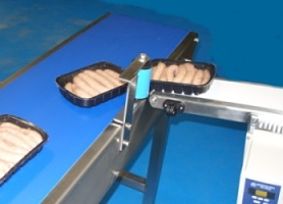 Food Conveyor Handling Sausages with Blue Food Grade Belting